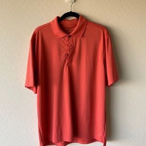 Men’s salmon color polo shirt.